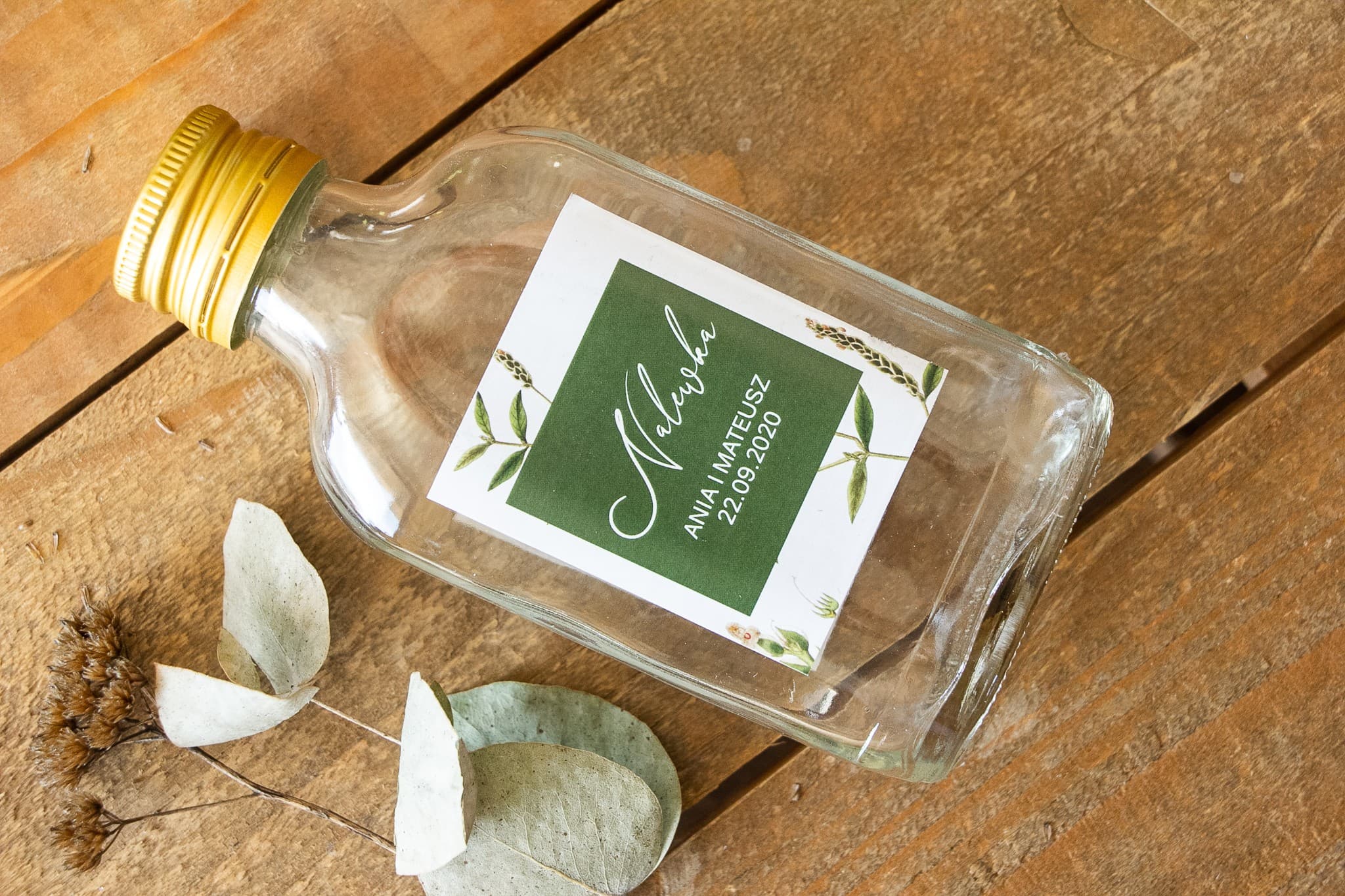 Podziękowania dla gości w formie butelek na nalewki z zieloną gałązką Korani nr 9 - 2